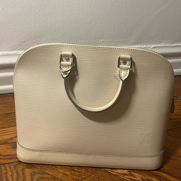 Louis Vuitton
Alma Handbag white Epi Leather PM - Picture 10 of 16
